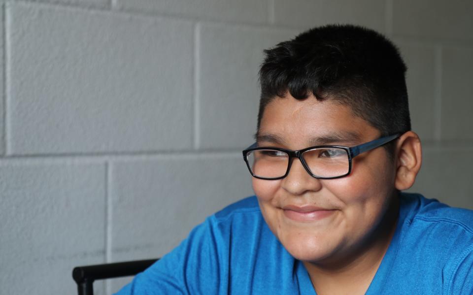 Brandon Garcia, 13, found virtual school to be tough. His grades slipped and some days he climbed an apple tree to connect to school because the internet connection was better.