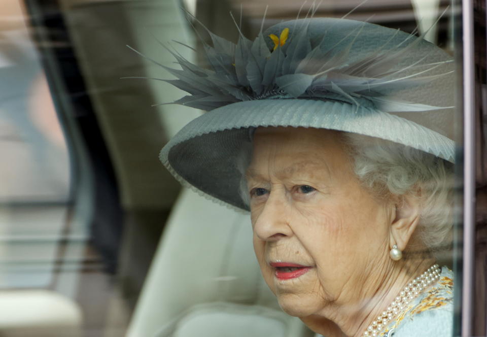 Britain's Queen Elizabeth arrives for the State Opening of Parliament at the Palace of Westminster, where a scaled-back ceremony takes place due to the coronavirus disease (COVID-19) restrictions, in London, Britain, May 11, 2021. REUTERS/John Sibley     TPX IMAGES OF THE DAY