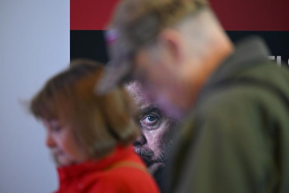 An image of Bannon is seen as people attend CPAC on Feb. 22, 2024.<span class="copyright">Matt McClain—The Washington Post/Getty Images</span>