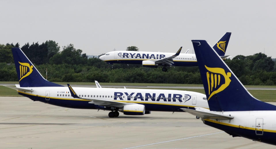 FILE- In this Tuesday July 21, 2009 file photo, Ryanair planes are seen at Stansted Airport in England. Ryanair chief executive Michael O’Leary says the 18 percent drop in sterling’s value since Britain voted in June to leave the European Union has hit the euro value of 26 percent of the airline’s sales. As a result, he said Tuesday, Oct. 18, 2016, Ryanair’s fiscal 2017 forecast was being cut by 5 percent to a new range of 1.3 billion euros to 1.35 billion euros ($1.43 billion to $1.49 billion), still 7 percent better than in 2016. (AP Photo/Matt Dunham, File).