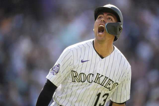 Jones homers and Trejo has 4 hits as the Rockies beat the