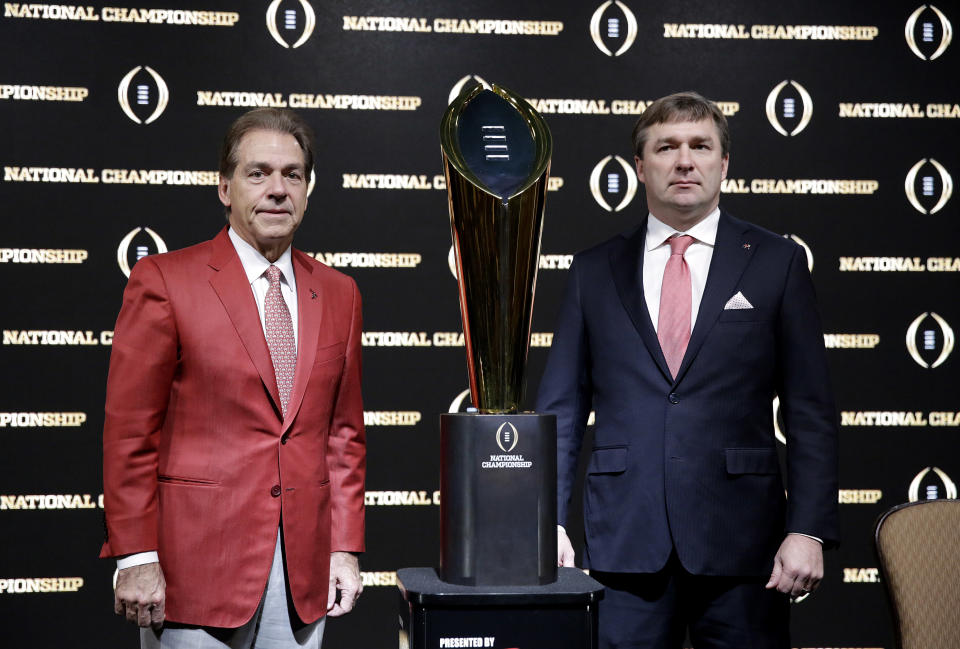 Georgia head coach Kirby Smart (R) learned a lot from Alabama’s Nick Saban, but he was on a path for coaching success well before he worked for him. (AP)