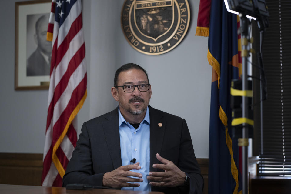 Arizona Secretary of State Adrian Fontes, a Democrat, speaks during an interview with the Associated Press in Arizona, Monday, March 4, 2024. (AP Photo/Serkan Gurbuz)