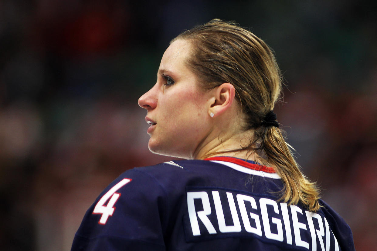 25 February 2010: USA's Angela Ruggiero #4 sheds a small tear prior to the medal ceremony at the end of the Women's Ice Hockey Gold Medal Game between Canada and the United States held at Canada Hockey Place during the Vancouver 2010 Winter Olympics in Vancouver, British Columbia, Canada. Final Score: Canada 2 USA 0. Canada wins Gold Medal and USA wins Silver Medal (Photo by Bob Frid/Icon SMI/Corbis/Icon Sportswire via Getty Images)