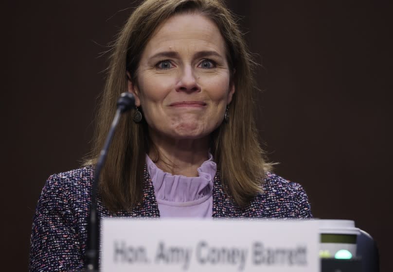 Supreme Court nominee Amy Coney Barrett testifies during the third day of her confirmation hearings before the Senate Judiciary Committee on Capitol Hill in Washington, Wednesday, Oct. 14, 2020. (Jonathan Ernst/Pool via AP)