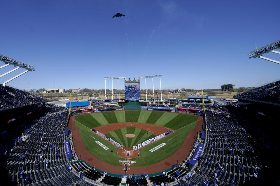 A B-2 Stealth Bomber flies over Kauffman Stadium before a baseball game between the Kansas City Royals and the Texas Rangers on Thursday, April 1, 2021, in Kansas City, Mo. (AP Photo/Charlie Riedel)