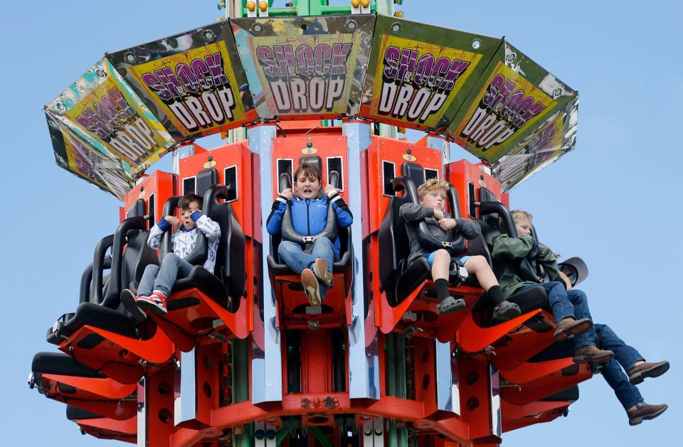 Fairgoers ride the Shock Drop on Friday, youth day, at the Ashland County Fair.