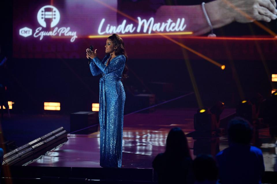 Mickey Guyton presents Equal Play Award to Linda Martell during the 2021 CMT Music Awards at Bridgstone Arena in Nashville, Tenn, on Wednesday, June 9, 2021.