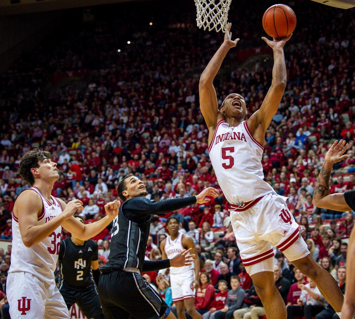 Indiana's Malik Reneau (5) scores during the first half of the Indiana versus North Alabama men's basketball game at Simon Skjodt Assembly Hall on Thursday, December 21, 2023.