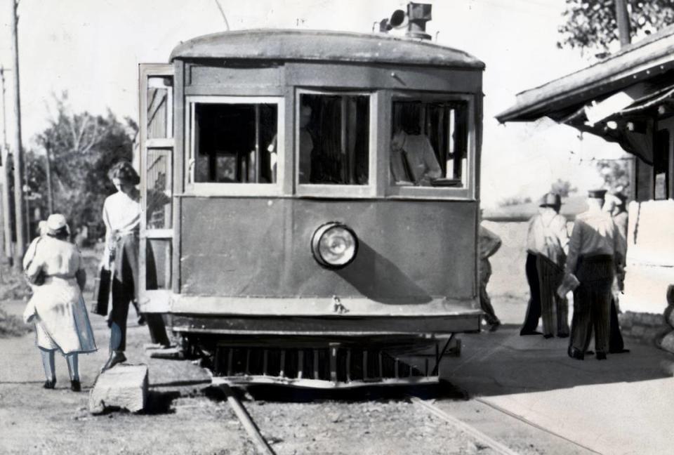 Passengers disembarked from a somewhat battered Strang Line railway car on July 9, 1940, the last day of the line’s operation and of Kansas City’s interurban system. File photo