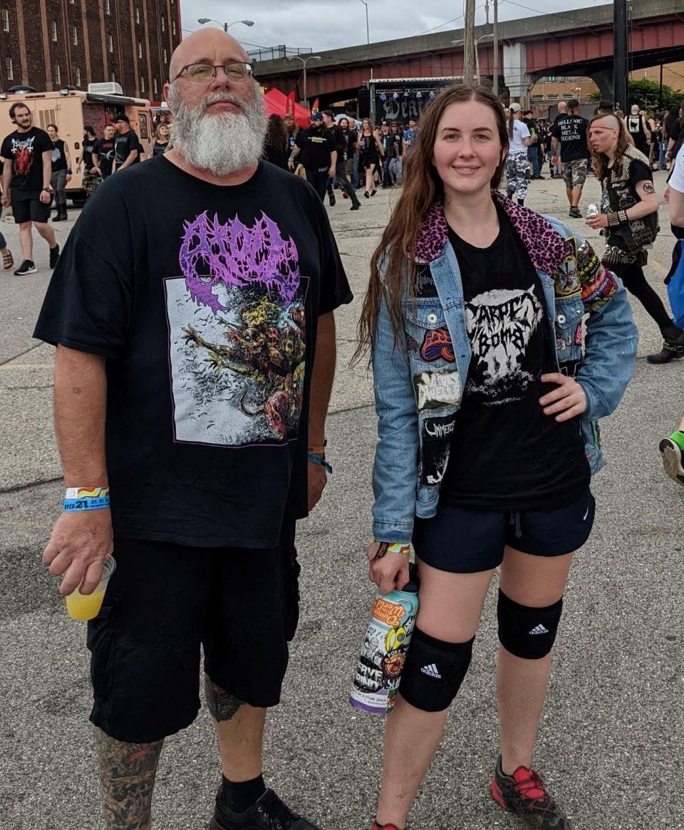 Darren Falkenburry and his daughter Jessica at a heavy metal show