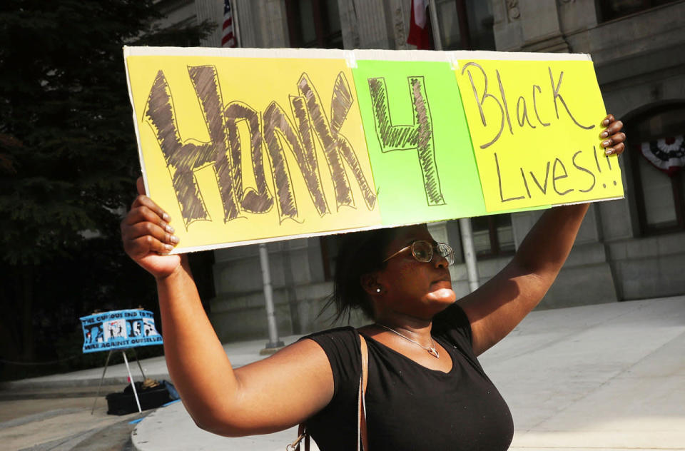 <p>A small group of Black Lives Matters supporters walk through downtown before the start of the Democratic National Convention (DNC) on July 24, 2016 in Philadelphia, Pennsylvania. (Spencer Platt/Getty Images)</p>