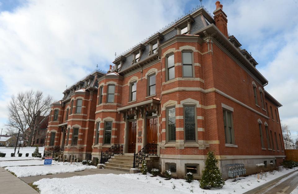 The Canalside Townhouses are shown Dec. 18, 2020 in the 300 block of West Sixth Street in Erie. The apartments are owned and operated by Tom Hagen, chairman of Erie Insurance.