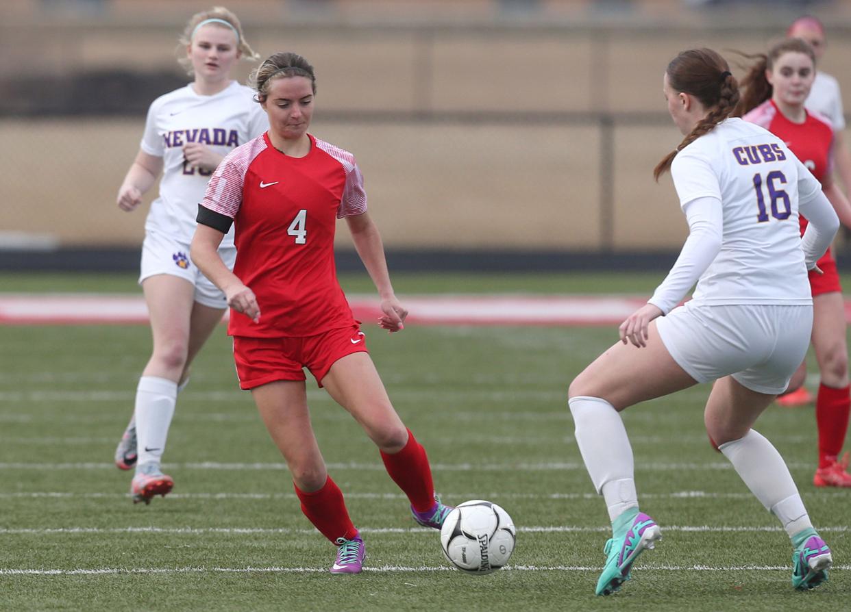 Elle O'Brien (4) scored the winning goal for Gilbert in the second overtime of its 1-0 victory over rival Nevada to open the 2024 season Monday. O'Brien and her twin sister Katie give the Tigers two tremendous senior leaders as they look to make it back to the 1A state championship game.