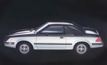 <p>Based on the '80s Ford Escort hatchback, the frog-eyed, two-passenger EXP coupe arrived for the 1982 model year overweight and underpowered. After an optional close-ratio transmission and a high-output version (as if 80 horsepower qualifies as "high output") version failed to spark buyer interest, Ford went for broke in 1984 and offered the 120-hp EXP Turbo Coupe. A second-generation version, dubbed the Escort EXP, ditched the original's frog eyes, but it was too little too late. The model was discontinued after the 1988 model year.<em>-Andrew Wendler</em></p>