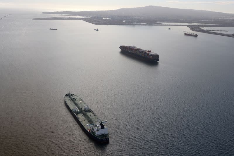 FILE PHOTO: An oil tanker waits in line in the ocean outside the Port of Long Beach-Port of Los Angeles complex, amid the coronavirus disease (COVID-19) pandemic, in Los Angeles