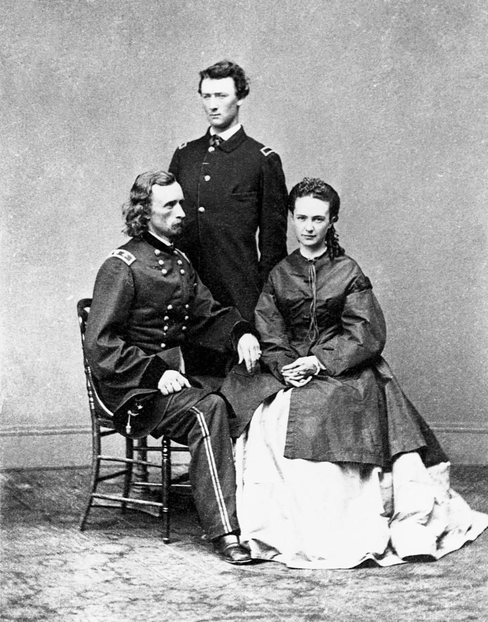 Portrait of General George A. Custer with his brother, Tom, and wife, Libbie.<span class="copyright">Corbis/Getty Images</span>