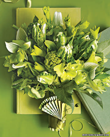 <div class="caption-credit"> Photo by: David Meredith</div><b>Fresh Green Frills Bouquet</b> <br> <br> Think about going green (and we don't mean with an all-bamboo bouquet). This fresh-as-cut-grass combo of lady's slipper orchids, hellebores, viburnum, gladiolus, and parrot tulips has a decidedly sophisticated vibe. Try attaching a tiny handmade fan to the handle with a hatpin; its pleats echo the blooms' frilly petals.