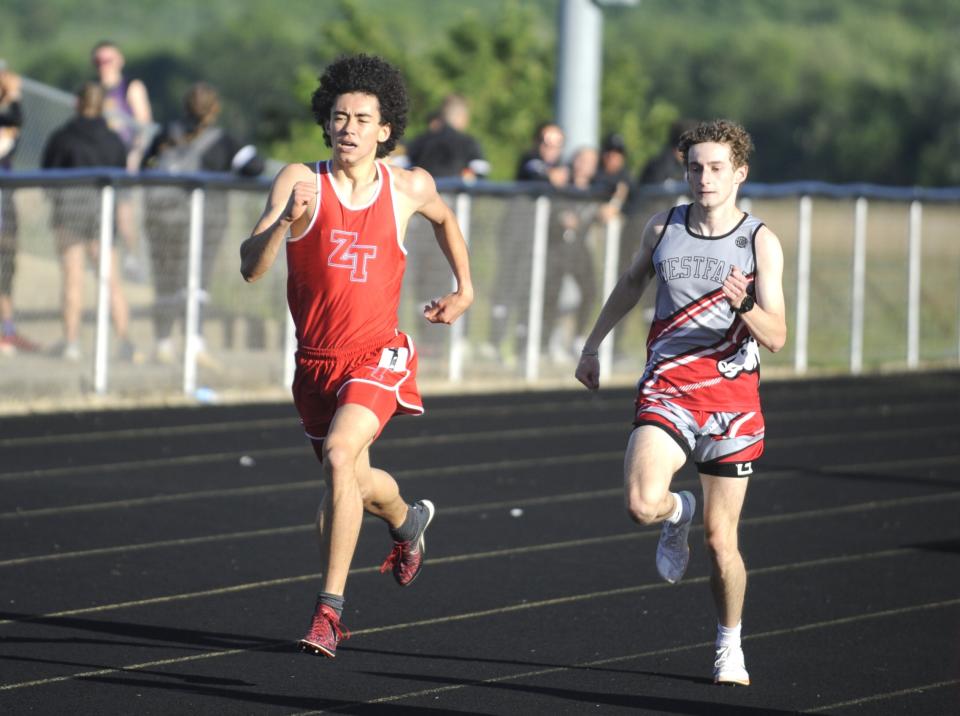 Zane Trace's Wyatt Vick (left) paces Westfall's Josh Trapp during the boys 800-meter run at the Scioto Valley Conference track and field championships on May 10, 2024 at George Knisley Memorial Stadium in Bainbridge, Ohio.