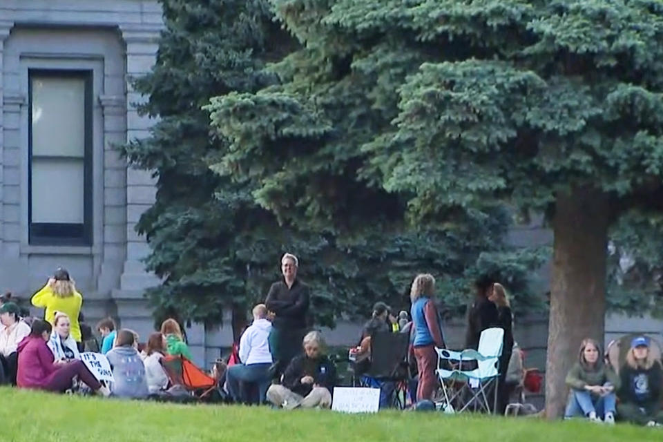 Women hold a sit-in at the Colorado Capitol on Monday to push for an end to gun violence. (KUSA)