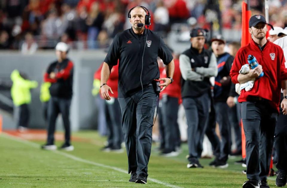 N.C. State head coach Dave Doeren walks the sidelines during the first half of N.C. State’s game against Florida State at Carter-Finley Stadium in Raleigh, N.C., Saturday, Oct. 8, 2022.