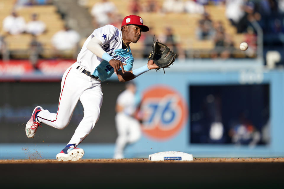 National League's Darren Baker makes a play on a ground ball during the sixth inning of the MLB All-Star Futures baseball game against the American League, Saturday, July 16, 2022, in Los Angeles. (AP Photo/Abbie Parr)