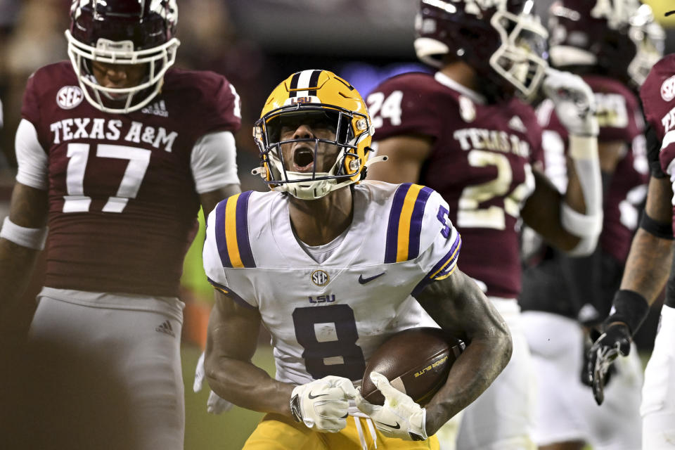 Nov 26, 2022; College Station, Texas, USA; LSU Tigers wide receiver Malik Nabers (8) reacts after a first down against the Texas A&M Aggies during the third quarter at Kyle Field. Mandatory Credit: Maria Lysaker-USA TODAY Sports