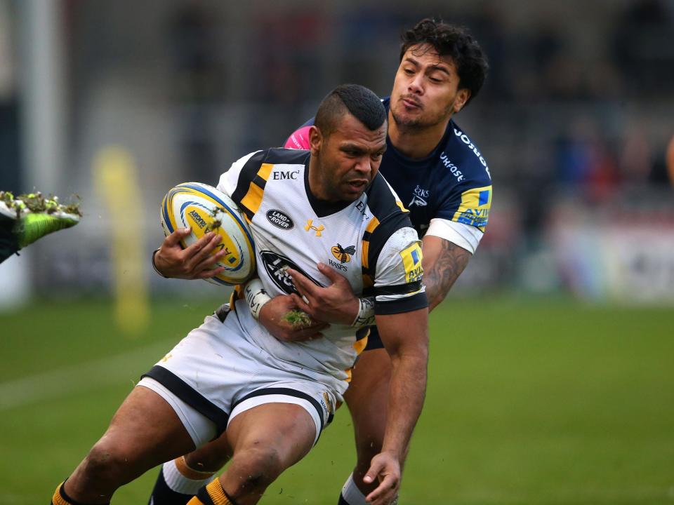 Kurtley Beale of Wasps is tackled by Denny Solomona (Getty Images)