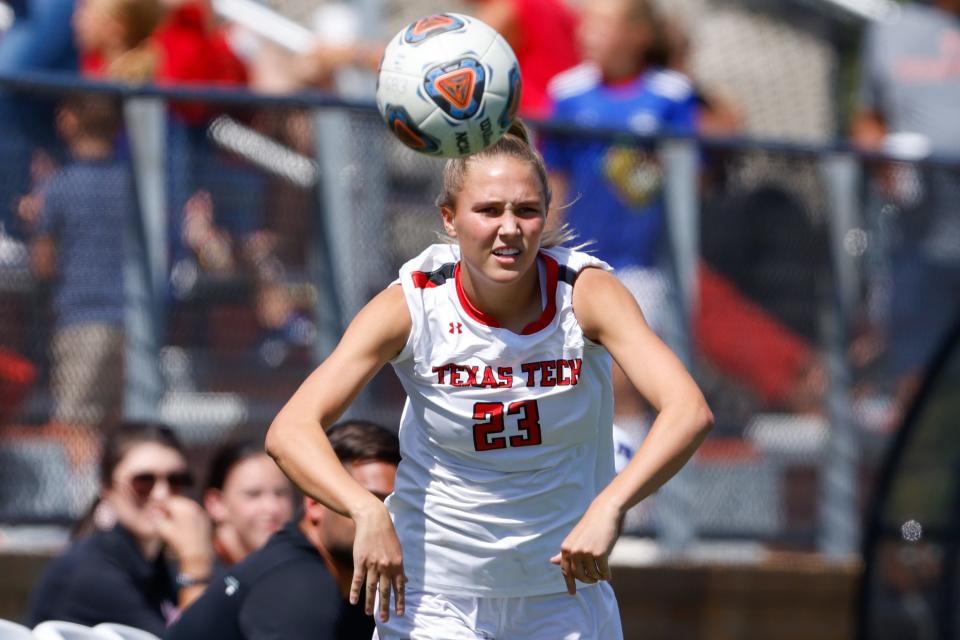 Texas Tech’s Macy Blackburn (23) throws the ball in during the team’s NCAA soccer match against Kansas State on Sunday, Sept. 26, 2021 at the John Walker Soccer Complex in Lubbock, Texas.