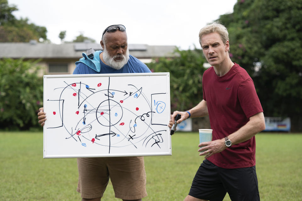 This image released by Searchlight Pictures shows David Fane, left, and Michael Fassbender in a scene from "Next Goal Wins." (Hilary Bronwyn Gayle/Searchlight Pictures via AP)