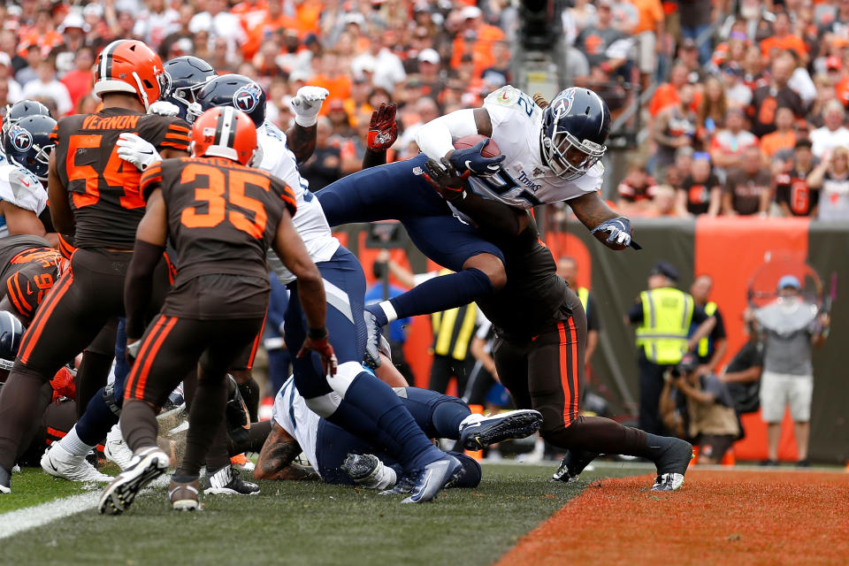 Derrick Henry #22 of the Tennessee Titans dives into the endzone for a touchdown during the second quarter of the game against the Cleveland Browns at FirstEnergy Stadium on September 8, 2019 in Cleveland, Ohio. (Photo by Kirk Irwin/Getty Images)