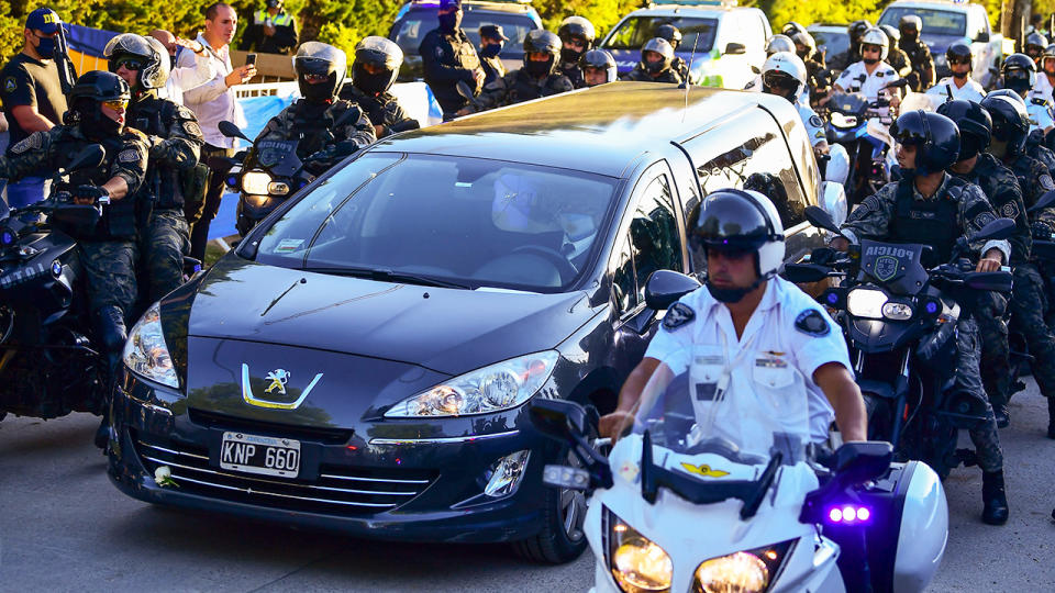 A hearse, pictured here carrying Diego Maradona's body to the Jardin Bella Vista cemetery. 