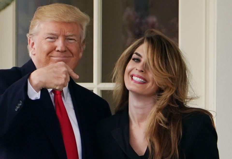 President Trump points to White House communications director Hope Hicks in 2018. (Mandel Ngan/AFP via Getty Images)