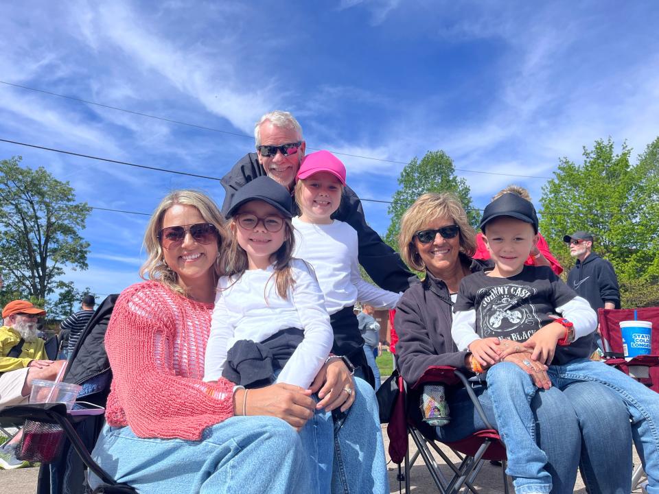 Kelsey Thornberry, left, is visiting for Thunder Over Louisville from Hawaii. She’s watching the show from the Indiana riverfront with her mom, stepdad and three children.