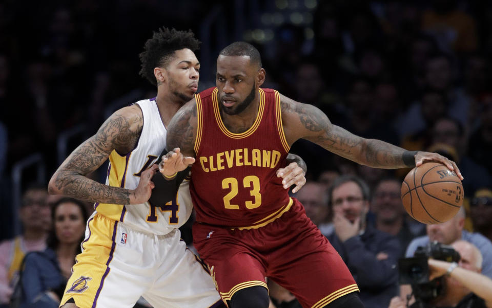 LeBron James and the Los Angeles Lakers cross paths. (AP)