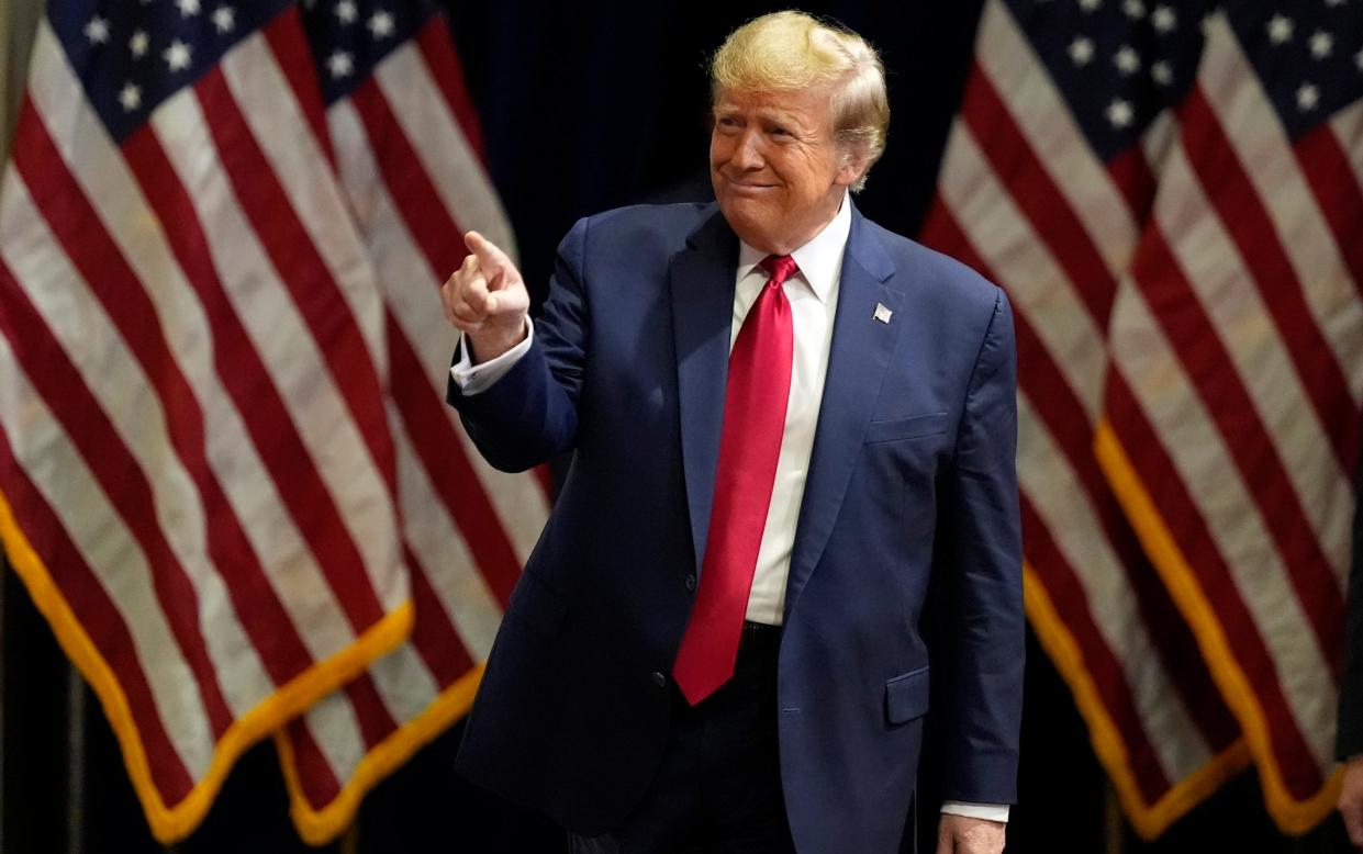 Donald Trump arrives at a rally in South Carolina on the eve of the state's primary