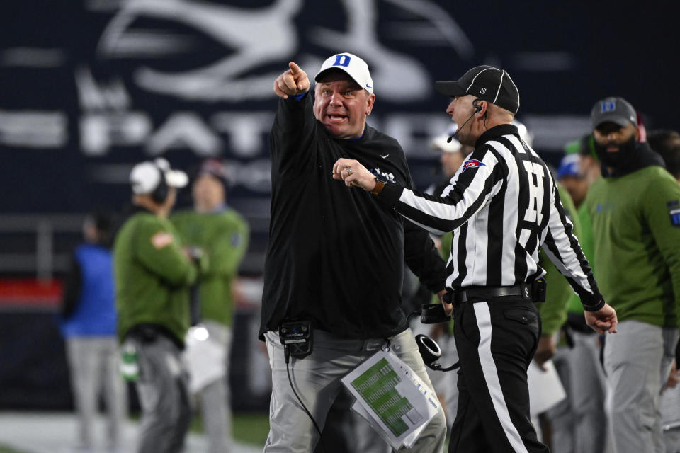 Duke head coach Mike Elko disputes a no call during the second half of the Military Bowl NCAA college football game against UCF, Wednesday, Dec. 28, 2022, in Annapolis, Md. (AP Photo/Terrance Williams)