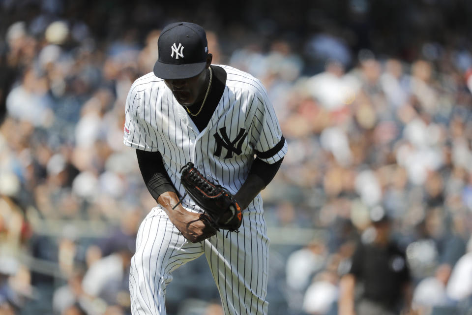 New York Yankees starting pitcher Domingo German reacts after three straight strikeouts against the Boston Red Sox in the sixth inning of a baseball game, Saturday, Aug. 3, 2019, in New York. (AP Photo/Michael Owens)