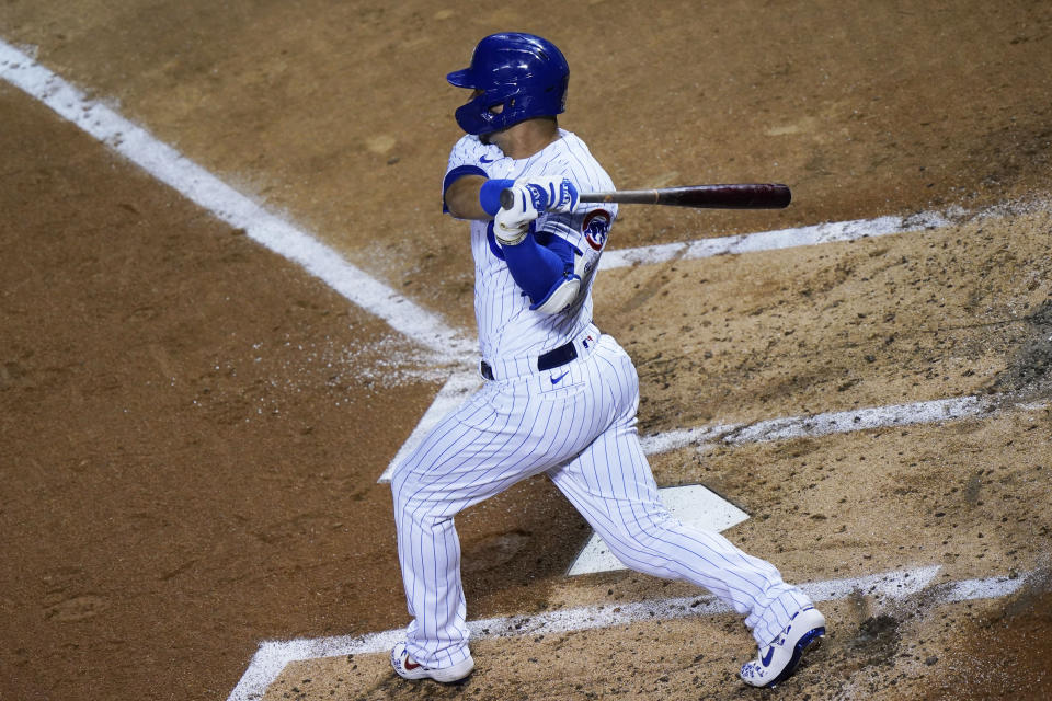Chicago Cubs' Willson Contreras hits a two-run single during the first inning of a baseball game against the St. Louis Cardinals in Chicago, Friday, Sept. 4, 2020. (AP Photo/Nam Y. Huh)