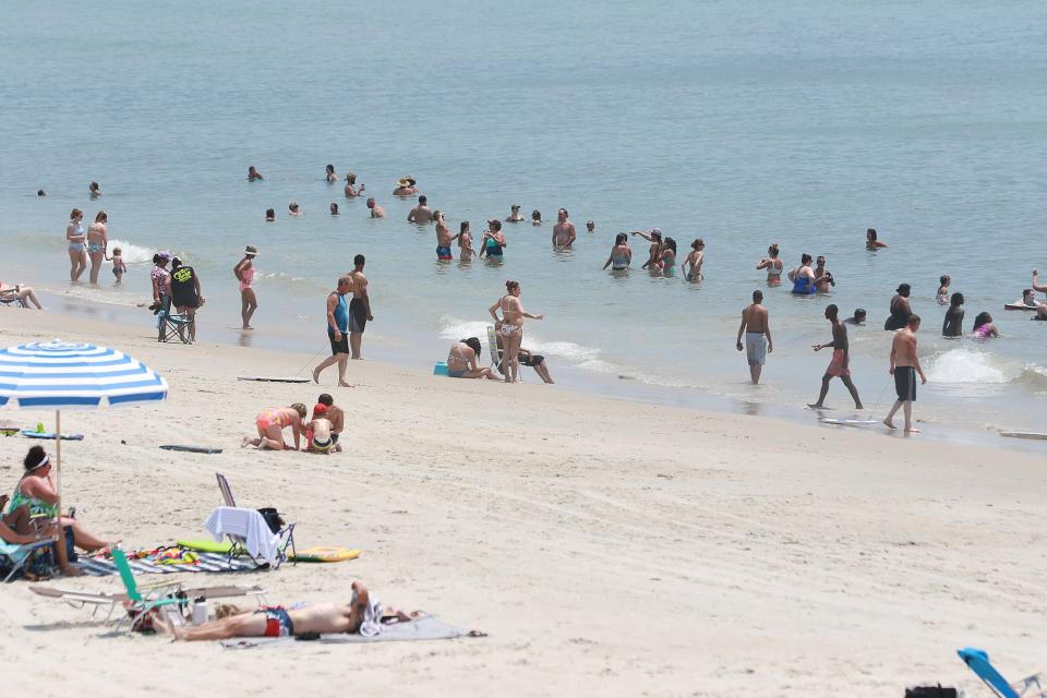 Families and friends at North Topsail Beach celebrate a previous year's 4th of July Holiday weekend.