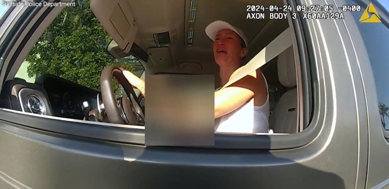 A photo of Gisele Bundchen crying on police bodycam footage
