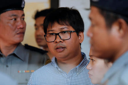 Detained Reuters journalist Kyaw Wa Lone is seen during a break at the court hearing in Yangon, Myanmar, Myanmar February 1, 2018. REUTERS/Jorge Silva