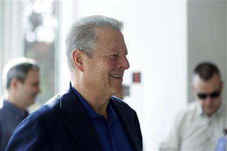 Former U.S. vice-president Al Gore arrives for Apple Inc's media event in Cupertino