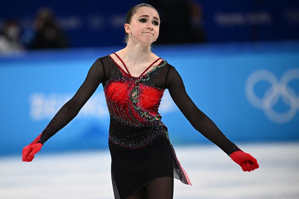 Russia's Kamila Valieva reacts after competing in a women's figure skating event during the Winter Olympic Games at the Capital Indoor Stadium in Beijing on Feb. 17, 2022. / Credit: Anne-Christine Poujoulat/AFP via Getty Images