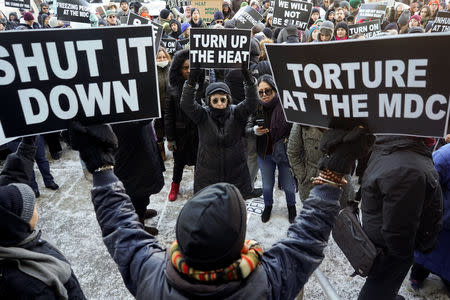 FILE PHOTO: Protesters attend a rally at Metropolitan Detention Center demanding that heat is restored for the inmates in the Brooklyn borough of New York City, New York, U.S., February 2, 2019. REUTERS/Go Nakamura/File Photo