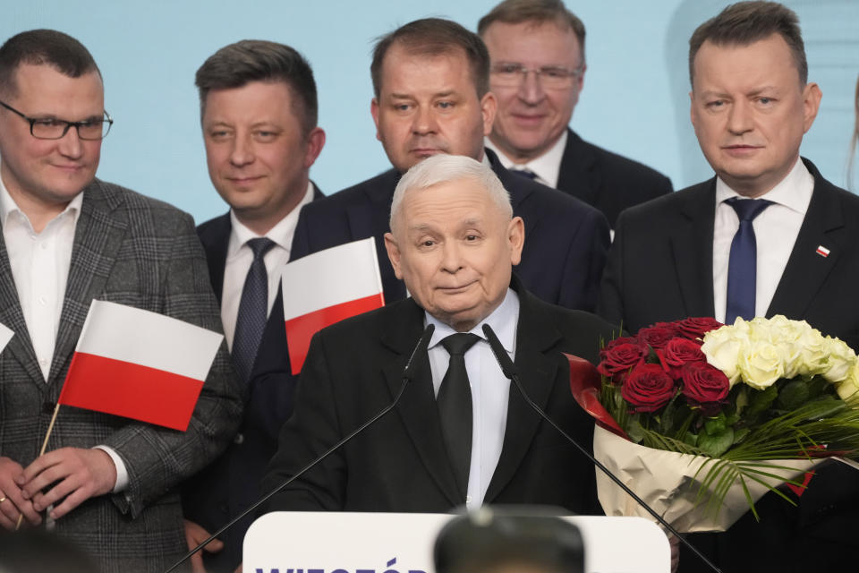 Conservative Law and Justice party leader Jaroslaw Kaczynski, center, speaks to supporters during Poland's local and regional elections in Warsaw, Poland, Sunday April 7, 2024. The vote is the first test at the ballot box for Prime Minister Donald Tusk four months after he took office. (AP Photo/Czarek Sokolowski)