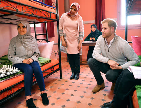 Britain's Prince Harry meets girls living at a boarding house in the town of Asni, Morocco February 24, 2019. Tim Rooke/Pool via REUTERS