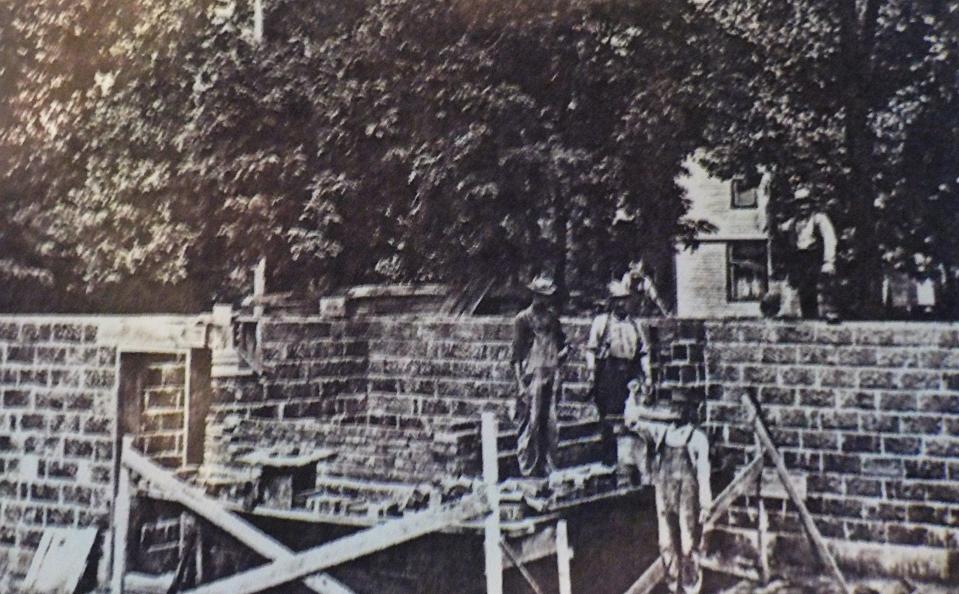 This 1916 photo shows workers constructing the present brick Emmanuel Lutheran Church in North Georgetown.