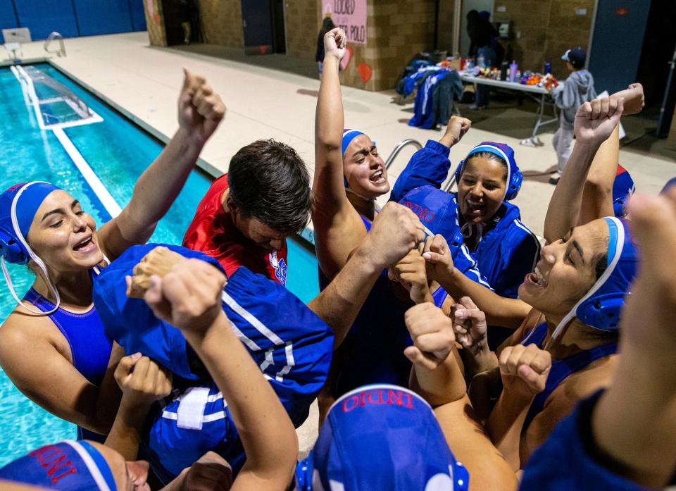 Indio players celebrate after winning their CIF-SS Division 6 semifinal game in Indio, Calif., Wednesday, Feb. 14, 2024.