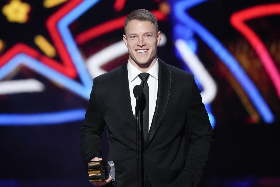 San Francisco 49ers' Christian McCaffrey, AP offensive player of the year speaks during the NFL Honors award show ahead of the Super Bowl 58 football game Thursday, Feb. 8, 2024, in Las Vegas. The San Francisco 49ers face the Kansas City Chiefs in Super Bowl 58 on Sunday. (AP Photo/David J. Phillip)